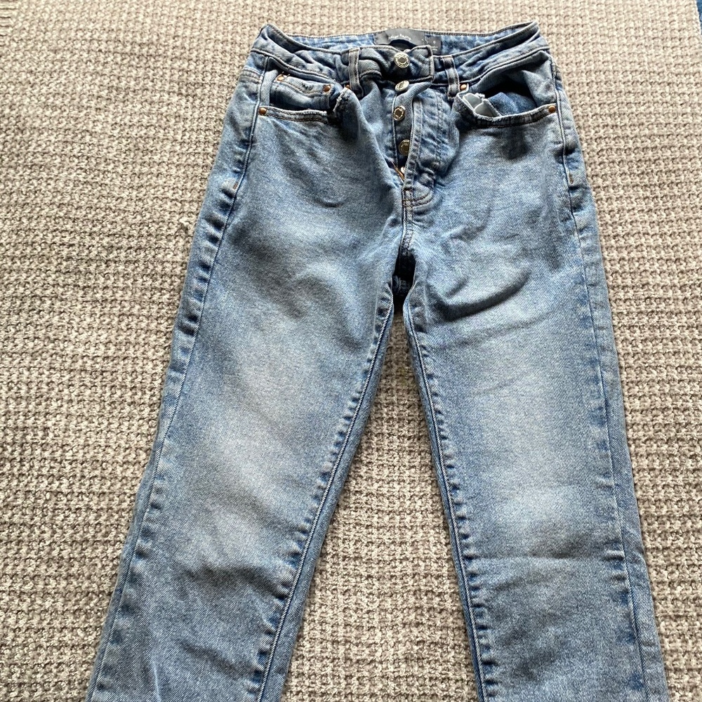 High rise blue jeans